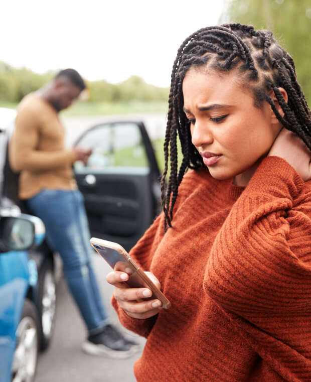 A woman holding her phone